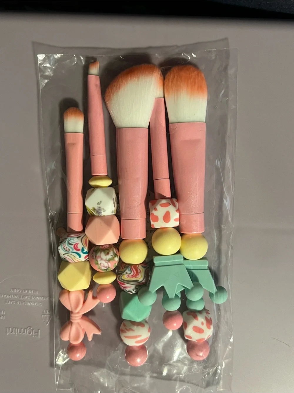 Pink makeup Brush Set with Decorative Beads, soft textured. Good brushes.